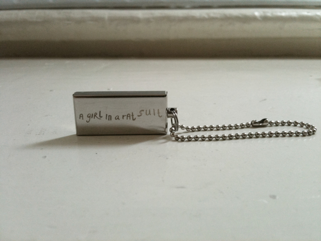 a girl in a rat suit usb key 1