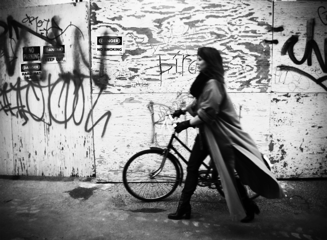 A girl in a rat suit walking